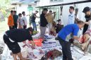 Karyawan BRI Muara Teweh saat berkurban dan membagikan kepada masyarakt sekitar, Rabu(27/05/2026).Foto humas BRI