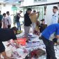 Karyawan BRI Muara Teweh saat berkurban dan membagikan kepada masyarakt sekitar, Rabu(27/05/2026).Foto humas BRI
