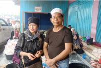 Foto Ketua Komisi III DPRD Barito Utara, H. Tajeri didampingi sang istri, Hj. Sofia