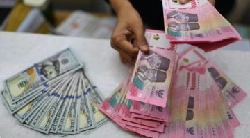 Ilustrasi Rupiah keok di hadapan dolar. [Antara]
