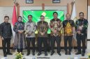 Foto Penyerahan laporan yang dilaksanakan di Palangkaraya