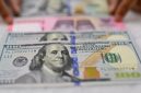 Ilustrasi nilai tukar rupiah terhadap dolar AS. [Antara] 