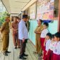 Foto Bupati Barito Utara H. Shalahuddin bersama Wakil Bupati Felix Sonadie Y. Tingan menuntaskan penyaluran Program SIP Pintar yang menyasar 9 kecamatan