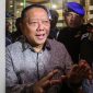 Mantan Jaksa Agung Muda Bidang Tindak Pidana Khusus Febrie Adriansyah (tengah) menjawab pertanyaan wartawan seusai menjalani pemeriksaan di Kejaksaan Agung, Jakarta, Jumat (24/7/2026). [ANTARA FOTO/Darryl Ramadhan/sgd] 