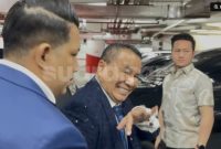 Pengacara kondang Hotman Paris menyambangi Kejaksaan Agung, pada Jumat (17/7/2026). (Suara.com/Faqih) 