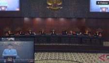 Tangkapan layar - Abdullah kuasa hukum DPR memberikan keterangan secara daring dalam sidang uji materiil UU Penyelenggara Ibadah Haji dan Umroh (PIHU) menyoal umroh mandiri, di Mahkamah Konstitusi, Jakarta, Selasa (28/7/2026). (ANTARA/YouTube/Mahkamah Konstitusi/Laily Rahmawaty) 