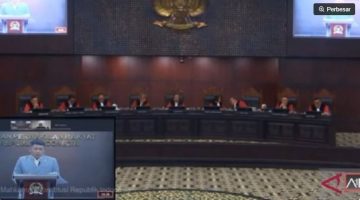 Tangkapan layar - Abdullah kuasa hukum DPR memberikan keterangan secara daring dalam sidang uji materiil UU Penyelenggara Ibadah Haji dan Umroh (PIHU) menyoal umroh mandiri, di Mahkamah Konstitusi, Jakarta, Selasa (28/7/2026). (ANTARA/YouTube/Mahkamah Konstitusi/Laily Rahmawaty) 