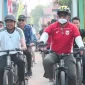Bupati dan Wakil Bupati Barito Utara, H. Shalahuddin dan Felix Sonadie Y. Tingan gowes bersama mengelilingi kota Muara Teweh, Jumat (21/8). Foto-ist

Artikel ini adalah bagian dari Mitra Promedia Group dan sudah tayang dengan judul 