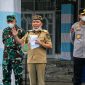 Gubernur Kalimantan Tengah H. Agustiar Sabran menyampaikan sambutan saat Apel Gelar Pasukan Penguatan Penanganan Karhutla di Halaman Istana Isen Mulang, Palangka Raya, Senin (31/8/26).