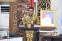 Asisten Perekonomian dan Pembangunan Setda Provinsi Kalimantan Tengah Anang Dirjo saat menghadiri Sosialisasi Permen PKP Nomor 6 Tahun 2026 tentang Bedah Rumah dan Petunjuk Teknisnya di Aula Bapperida Kalteng, Palangka Raya, Selasa (1/9/26).