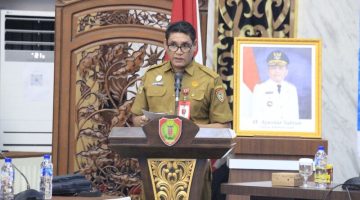 Asisten Perekonomian dan Pembangunan Setda Provinsi Kalimantan Tengah Anang Dirjo saat menghadiri Sosialisasi Permen PKP Nomor 6 Tahun 2026 tentang Bedah Rumah dan Petunjuk Teknisnya di Aula Bapperida Kalteng, Palangka Raya, Selasa (1/9/26).