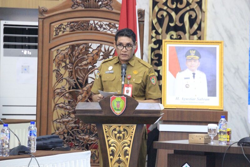 Asisten Perekonomian dan Pembangunan Setda Provinsi Kalimantan Tengah Anang Dirjo saat menghadiri Sosialisasi Permen PKP Nomor 6 Tahun 2026 tentang Bedah Rumah dan Petunjuk Teknisnya di Aula Bapperida Kalteng, Palangka Raya, Selasa (1/9/26).