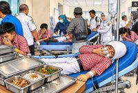 Ilustrasi pelajar di Kabupaten Pati keracunan MBG. [Dok Suara.com/AI]