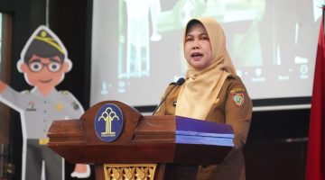 Plt. Asisten I Sekretariat Daerah Provinsi Kalimantan Tengah, Lisda Arriyana, menyampaikan sambutan dalam Rapat Forum Koordinasi Peningkatan Pelindungan Kekayaan Intelektual Berbasis Kewilayahan di Kantor Wilayah Kementerian Hukum Kalimantan Tengah, Senin (26/10/26).
